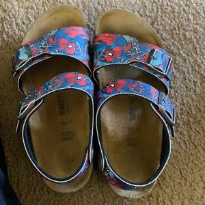 Kid Marvel Birkenstock sandals.